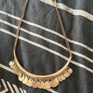 Gold colored necklace